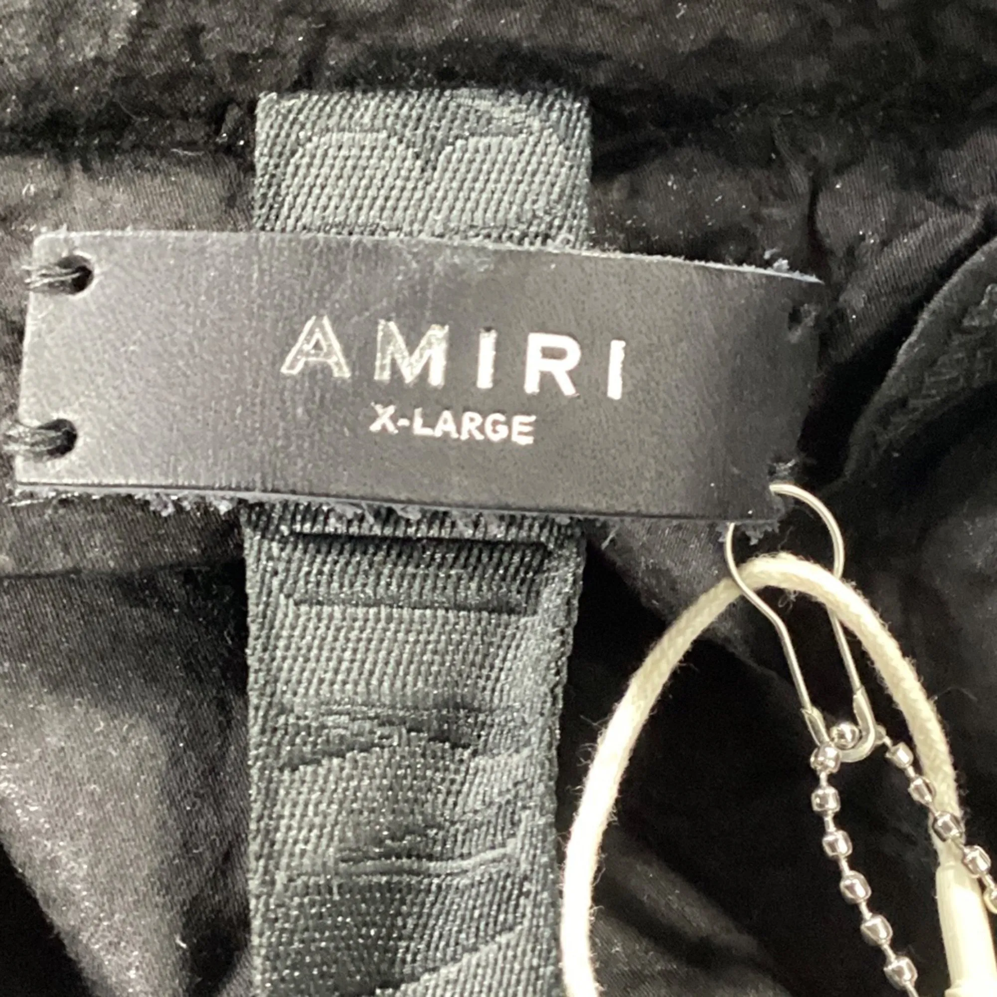 Amiri Graphic Print Parka in Black Cotton