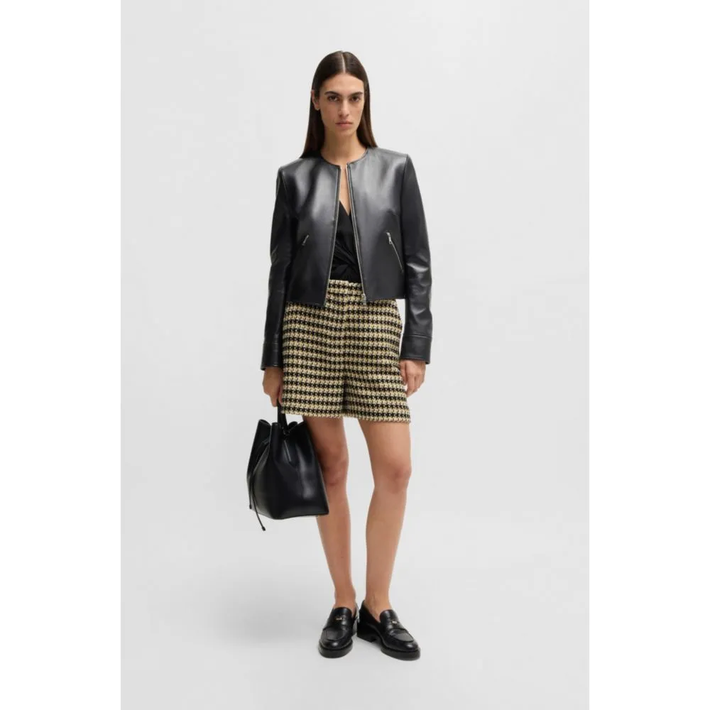 Collarless leather jacket with zip closure
