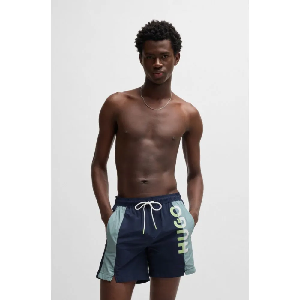Color-blocked swim shorts with two-tone logo