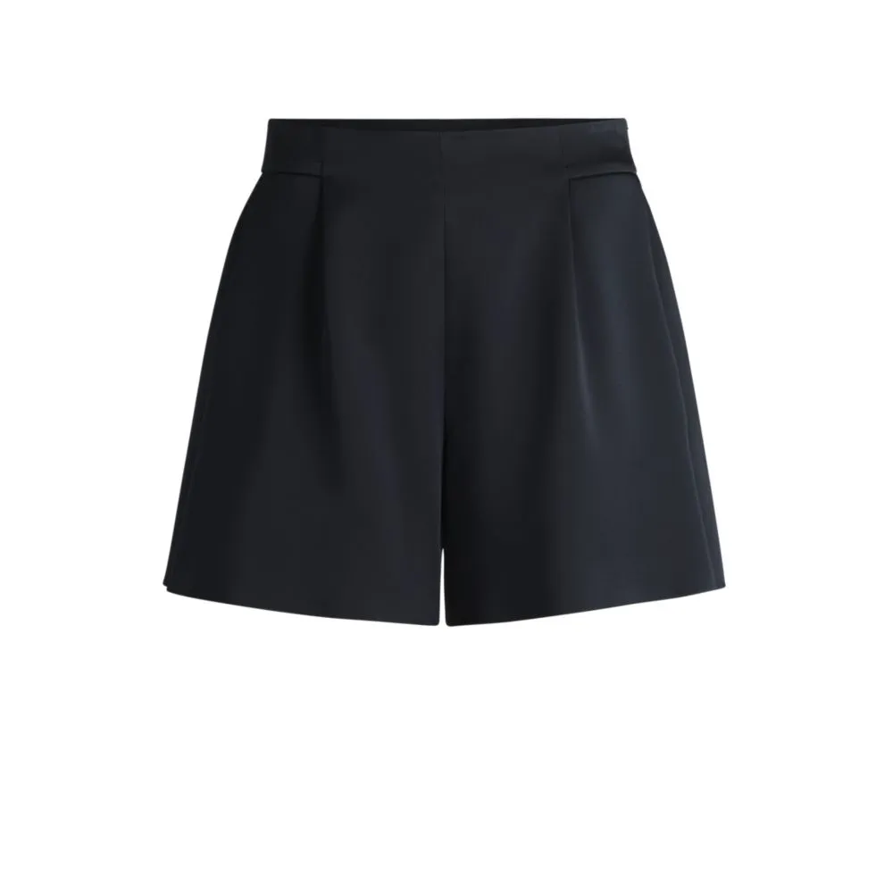 Relaxed-fit shorts with front pleats