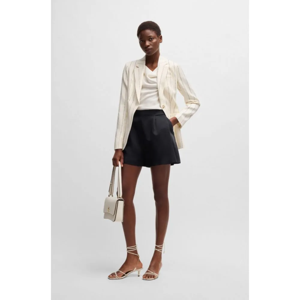 Relaxed-fit shorts with front pleats