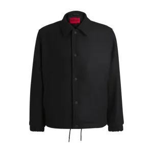 Wool coach jacket with adjustable hem