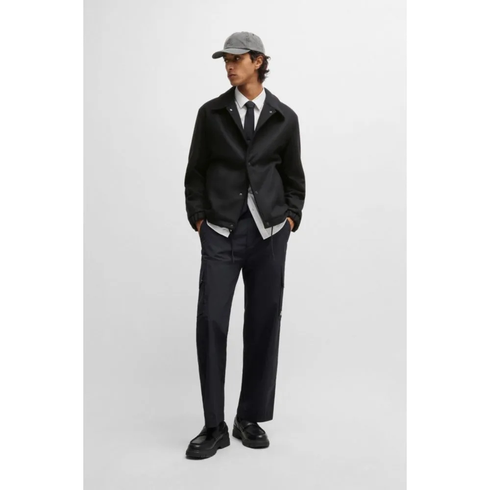 Wool coach jacket with adjustable hem